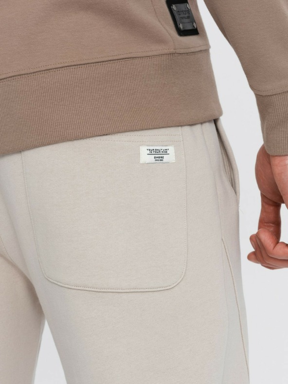 Ombre Clothing Béžové pánske tepláky Ombre Clothing