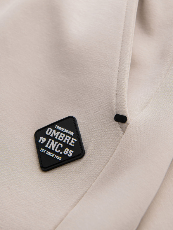 Ombre Clothing Pánske tepláky s rebrovanými manžetami a ozdobným zipsom - pieskové Oblečenie Ombre