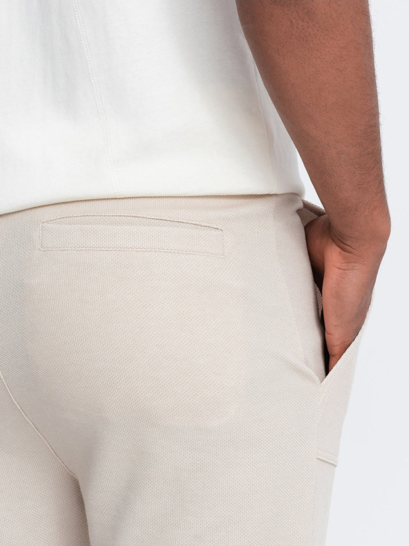 Ombre Clothing Béžové pánske tepláky Ombre Oblečenie