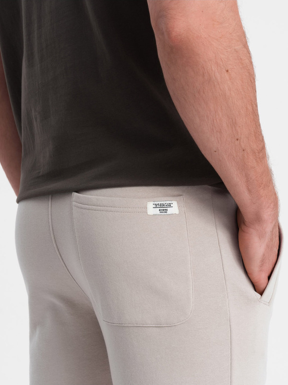 Ombre Clothing Béžové pánske tepláky Ombre Oblečenie