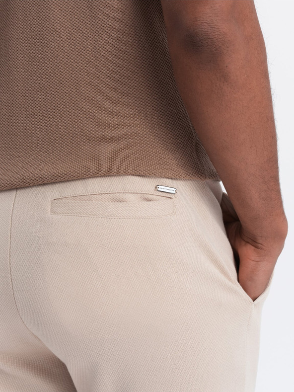 Ombre Clothing Béžové pánske mrkvové nohavice Ombre Oblečenie