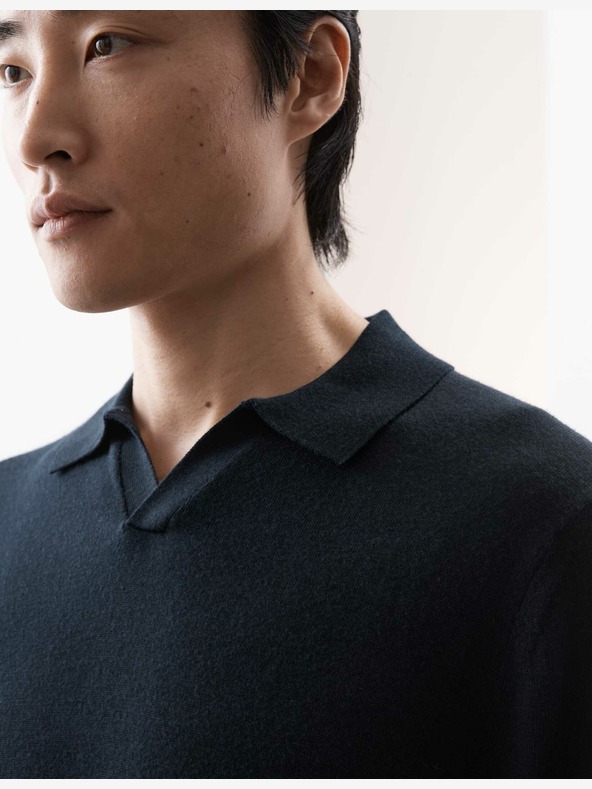 Marks & Spencer Pletená polokošeľa z čistej extra jemnej merino vlny Marks & Spencer námornícka modrá