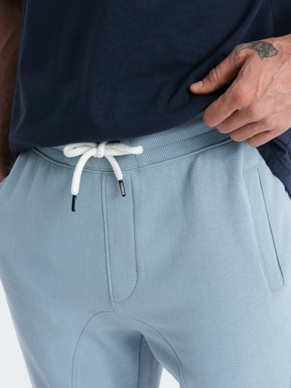 Ombre Clothing Modré pánske tepláky Ombre Clothing