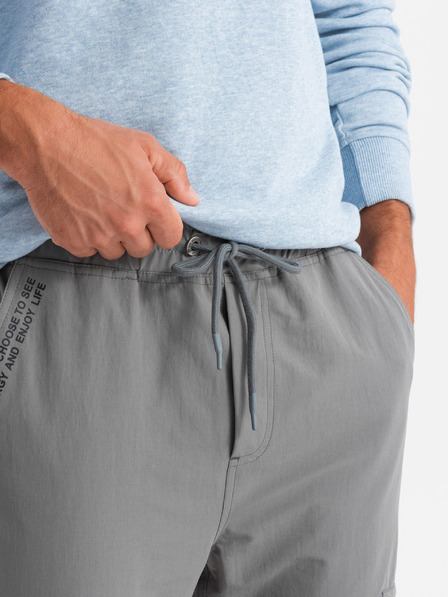 Ombre Clothing Pánske jogger nohavice s vreckami a potlačou sivá Ombre Oblečenie