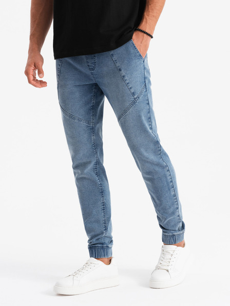 Ombre Clothing Pánske džínsové tepláky s asymetrickým prešívaním modré Ombre Oblečenie