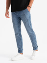 Ombre Clothing Pánske džínsové tepláky s asymetrickým prešívaním modré Ombre Oblečenie