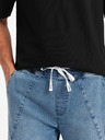 Ombre Clothing Pánske džínsové tepláky s asymetrickým prešívaním modré Ombre Oblečenie