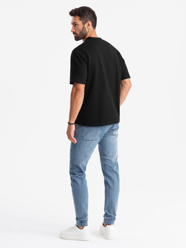 Ombre Clothing Pánske džínsové tepláky s asymetrickým prešívaním modré Ombre Oblečenie