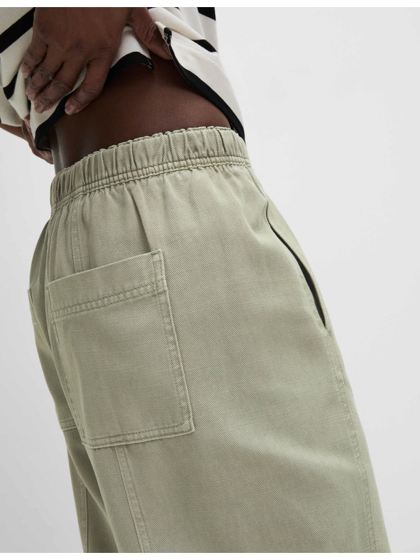 Marks & Spencer Farbené naťahovacie nohavice zúženého strihu so sťahovacou šnúrkou Marks & Spencer zelená