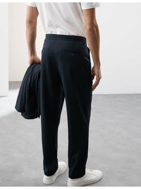 Marks & Spencer Oblekové nohavice vhodné na cestovanie Marks & Spencer námornícka modrá