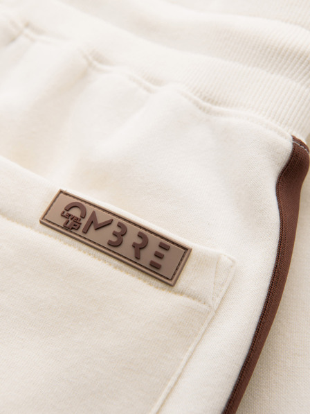 Ombre Clothing Pánske tepláky s lemovaním a rebrovanými lemami nohavíc - krémové