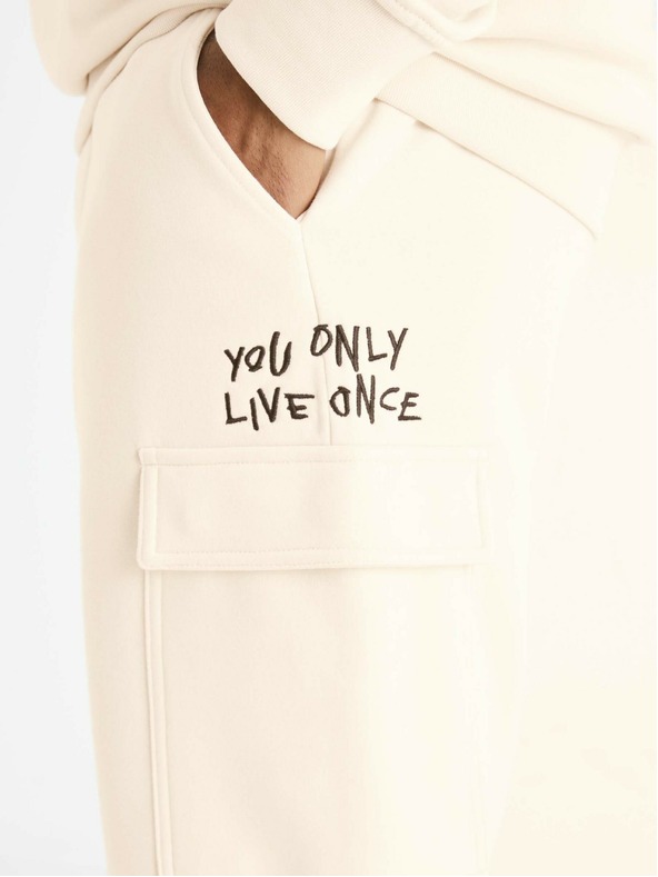 Celio Krémové pánske tepláky s vreckami Celio Boslap