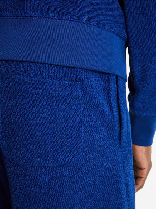 Celio Tmavomodré pánske teplákové šortky Celio Doreverse