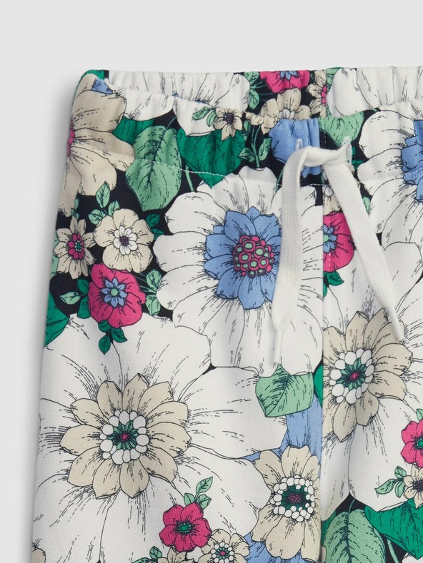 GAP Baby tepláky s kvetinovým vzorom GAP