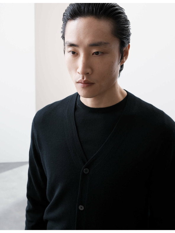 Marks & Spencer Kardigán s výstrihom do V z vlny merino Marks & Spencer modrá