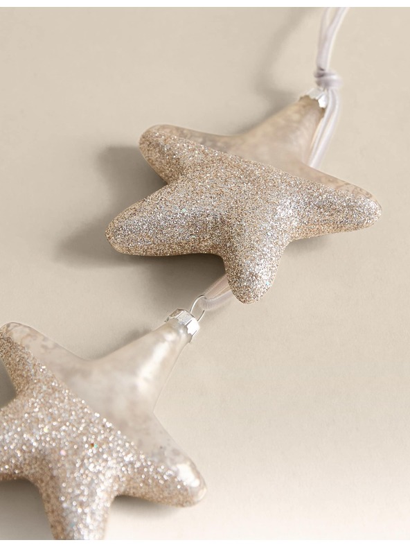 Marks & Spencer Sada 2 ks trblietavých ozdôb s hviezdičkami a ortuťou Marks & Spencer strieborná