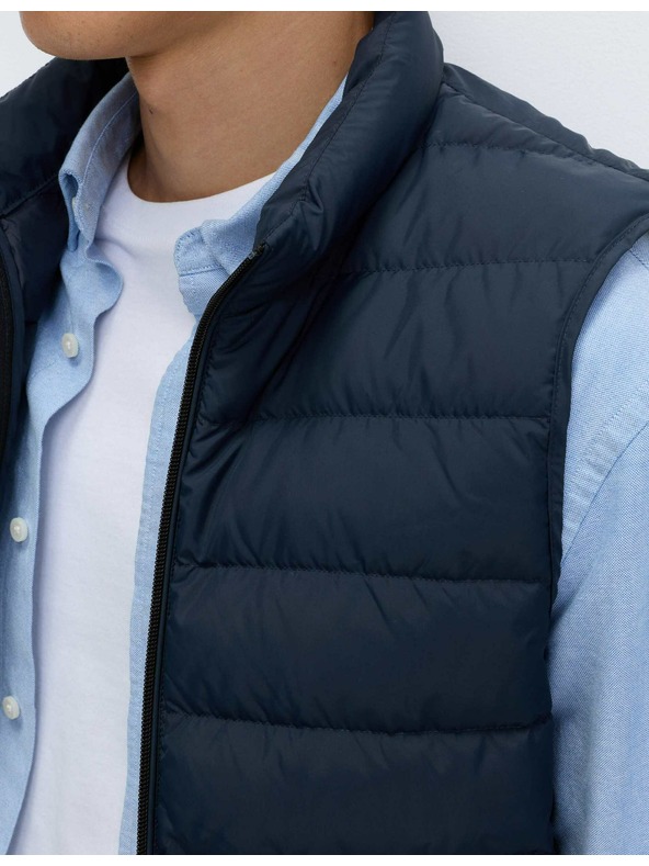 Marks & Spencer Ľahká vesta polstrovaná perím a prachovým perím Marks & Spencer námorná modrá