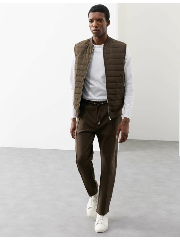 Marks & Spencer Prešívaná vesta so zapínaním na zips s technológiou Stormwear™ a s vysokým podielom bavlny Marks & Spencer zelená