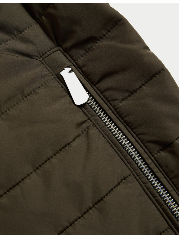 Marks & Spencer Prešívaná vesta so zapínaním na zips s technológiou Stormwear™ a s vysokým podielom bavlny Marks & Spencer zelená
