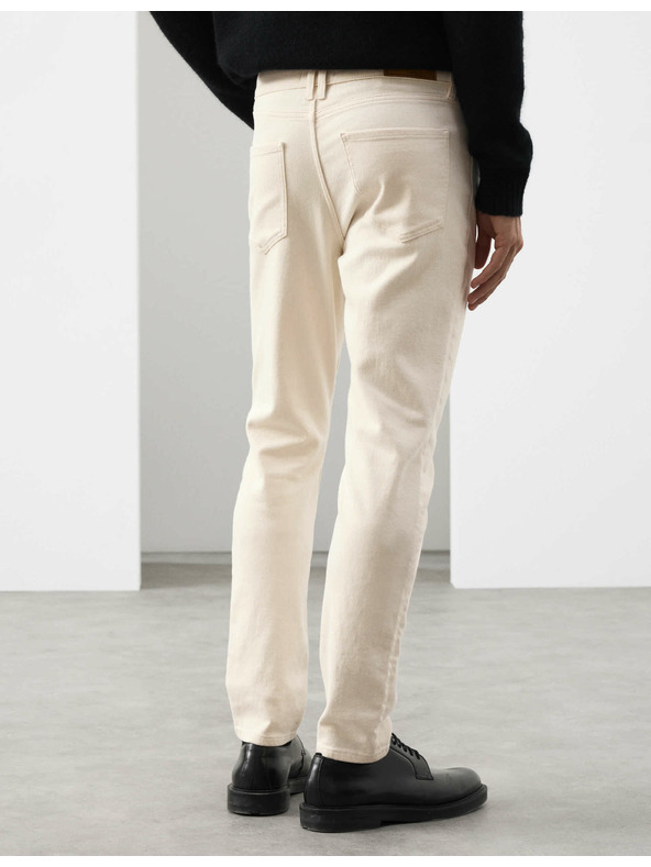 Marks & Spencer Talianske džínsy slim fit Marks & Spencer smotanová