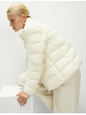 Marks & Spencer Prešívaná skladateľná bunda s perím a páperím Marks & Spencer smotanová