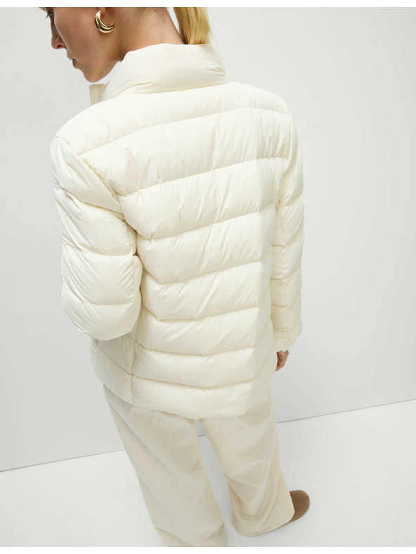 Marks & Spencer Prešívaná skladateľná bunda s perím a páperím Marks & Spencer smotanová