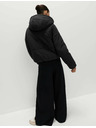 Marks & Spencer Prešívaná bunda s kapucňou s technológiou Thermowarmth™ Marks & Spencer čierna