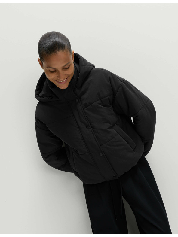 Marks & Spencer Prešívaná bunda s kapucňou s technológiou Thermowarmth™ Marks & Spencer čierna