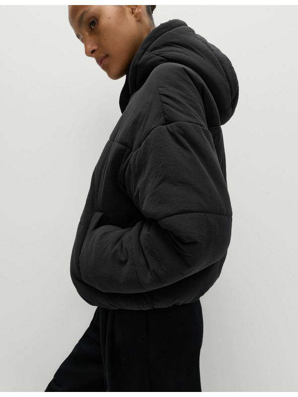 Marks & Spencer Prešívaná bunda s kapucňou s technológiou Thermowarmth™ Marks & Spencer čierna