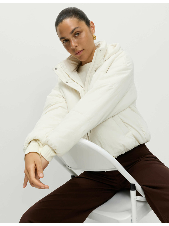 Marks & Spencer Prešívaná bunda s kapucňou s technológiou Thermowarmth™ Marks & Spencer béžová