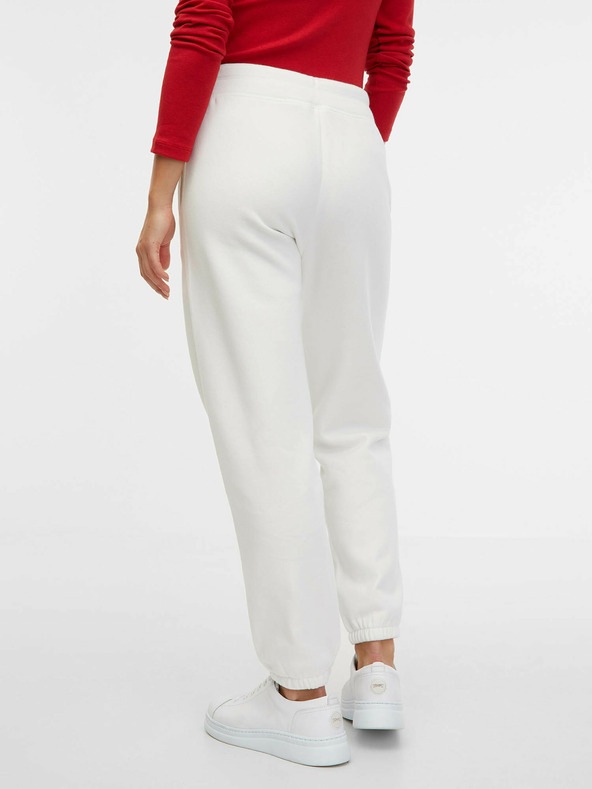 GAP Tepláky s logom GAP