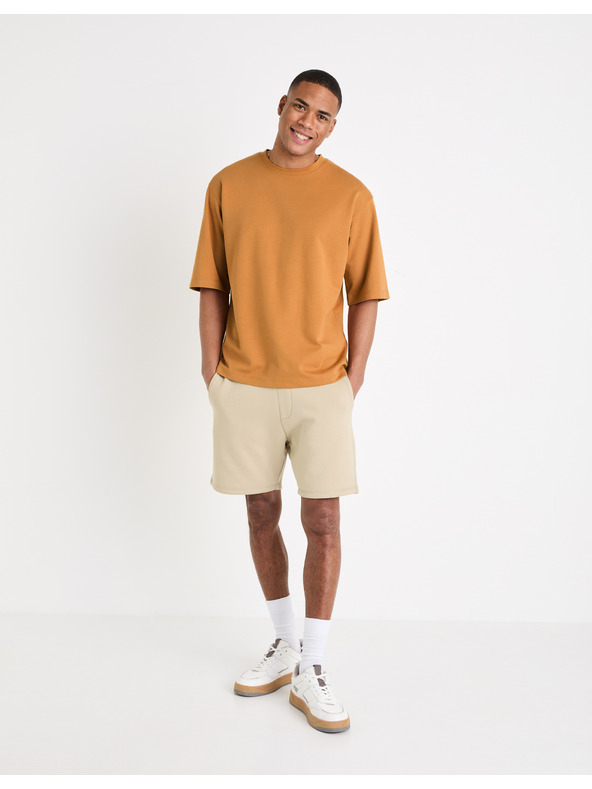 Celio Béžové pánske tepláky Celio Toshort