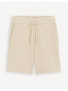 Celio Béžové pánske tepláky Celio Toshort