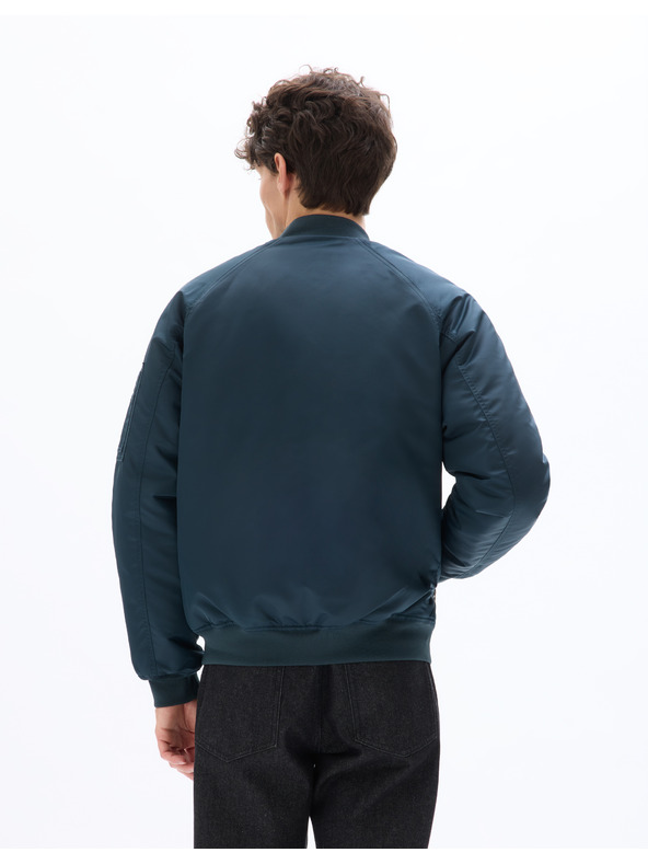 Celio Bunda bomber Mujames