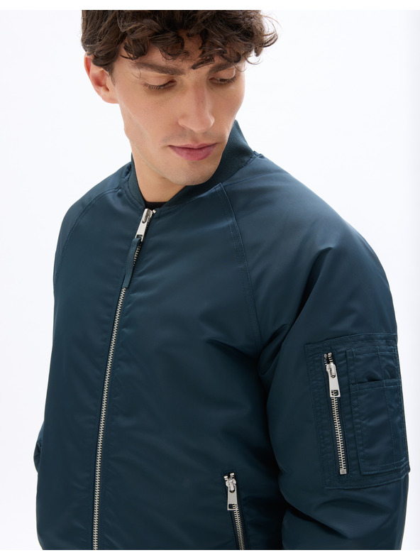Celio Bunda bomber Mujames