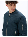 Celio Bunda bomber Mujames