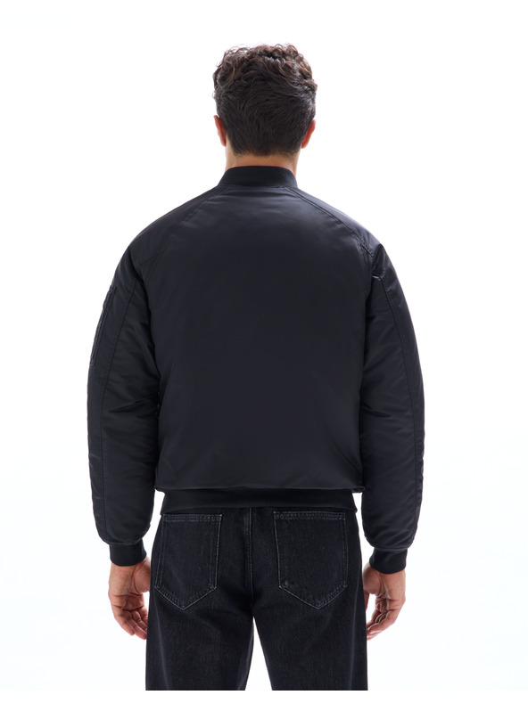 Celio Bunda bomber Mujames