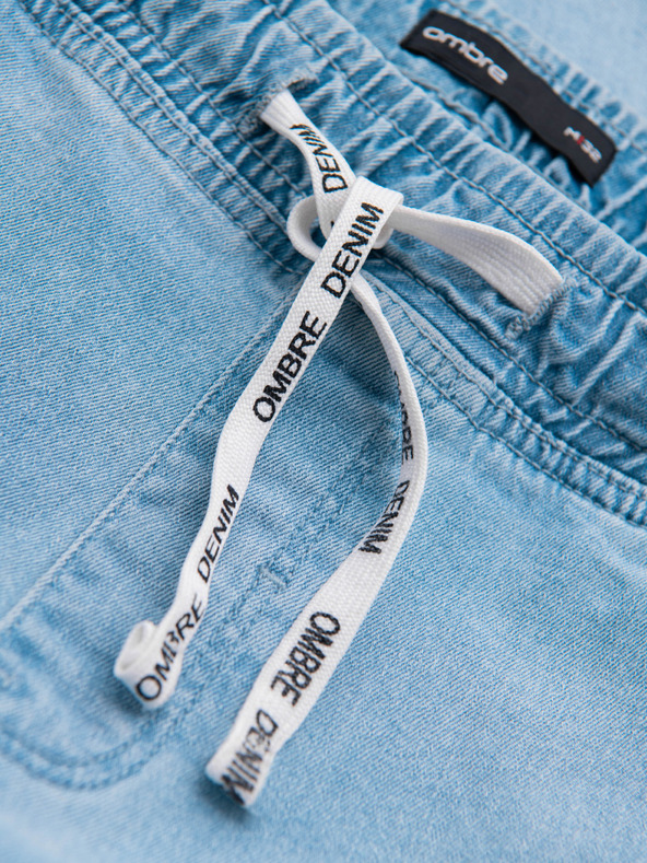 Ombre Clothing Pánske džínsové nohavice JOGGERS s pracím efektom - svetlo modré V1 OM-PADJ-0267 Ombre Clothing