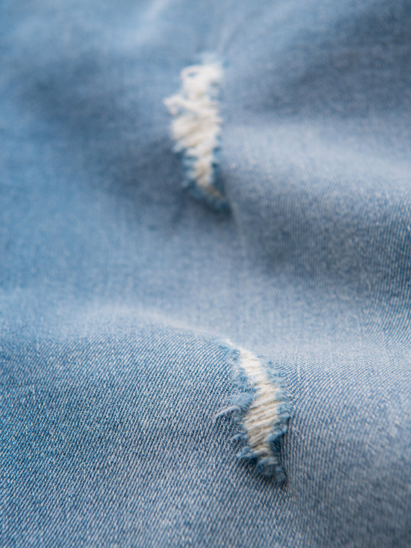 Ombre Clothing Pánske džínsové nohavice SLIM FIT s ostrihnutím - svetlo modré V1 OM-PADP-0255 Ombre Clothing