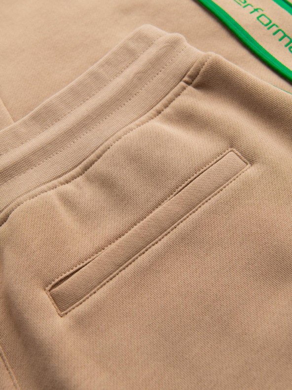 Ombre Clothing Pánske športové nohavice s lemovaním - hnedé V1 OM-PASK-0284 Ombre Clothing