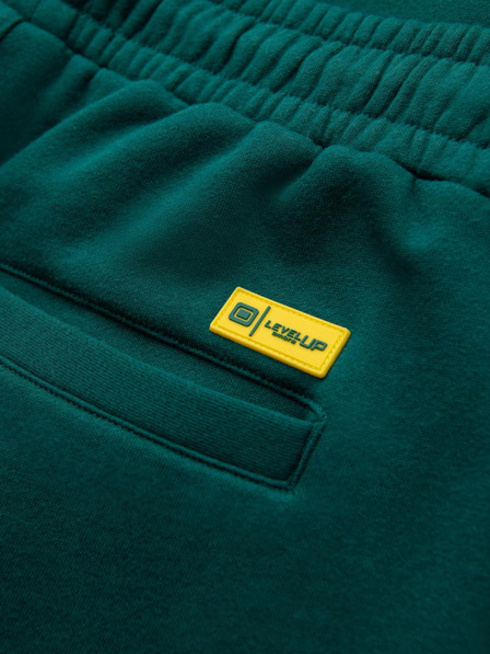 Ombre Clothing Klasické unisex tepláky so žebrovanými manžetami - tmavo zelené V17 OU-PSBC-0100 Ombre Clothing