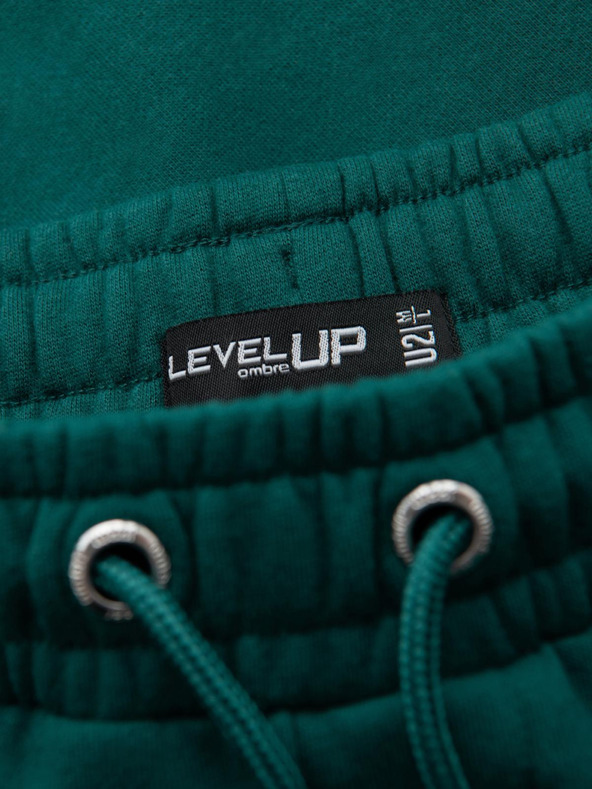 Ombre Clothing Klasické unisex tepláky so žebrovanými manžetami - tmavo zelené V17 OU-PSBC-0100 Ombre Clothing