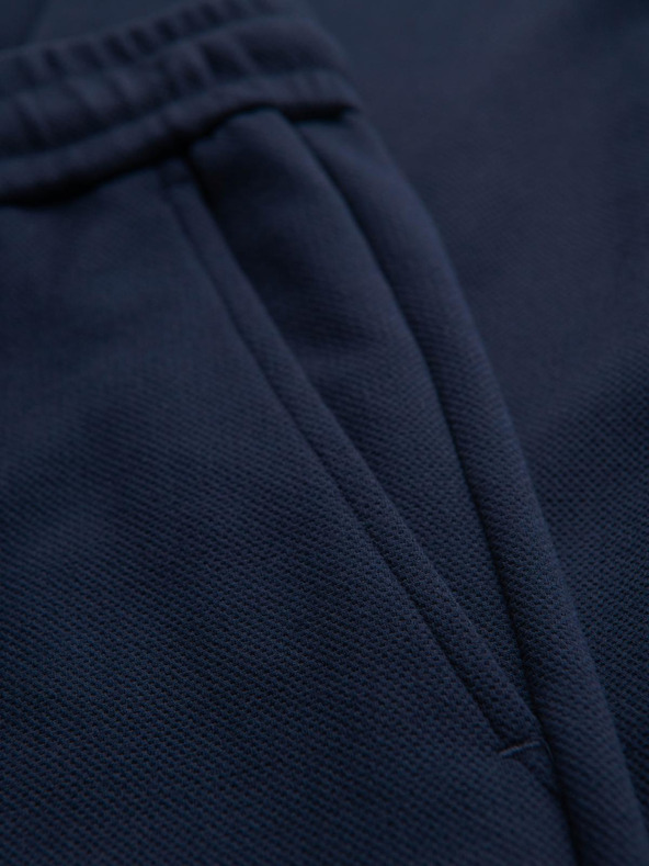 Ombre Clothing Pánske nohavice z piké úpletu s nastaviteľným pásom - tmavo modré V1 OM-PACP-0283 Ombre Clothing