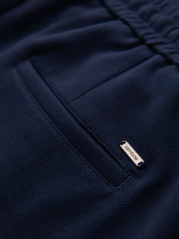 Ombre Clothing Pánske nohavice z piké úpletu s nastaviteľným pásom - tmavo modré V1 OM-PACP-0283 Ombre Clothing