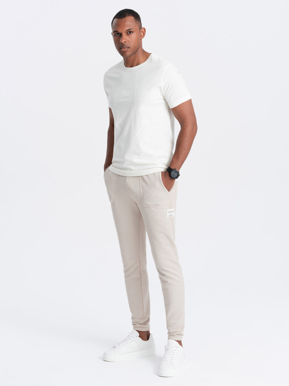 Ombre Clothing Béžové pánske tepláky Ombre Oblečenie