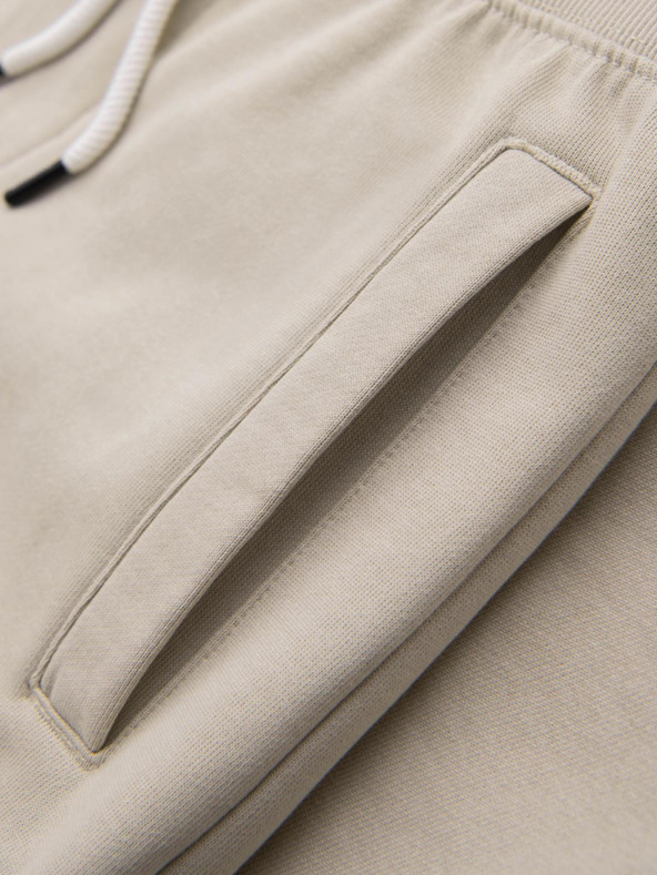 Ombre Clothing Béžové pánske tepláky Ombre Oblečenie