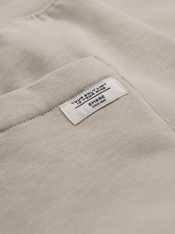 Ombre Clothing Béžové pánske tepláky Ombre Oblečenie