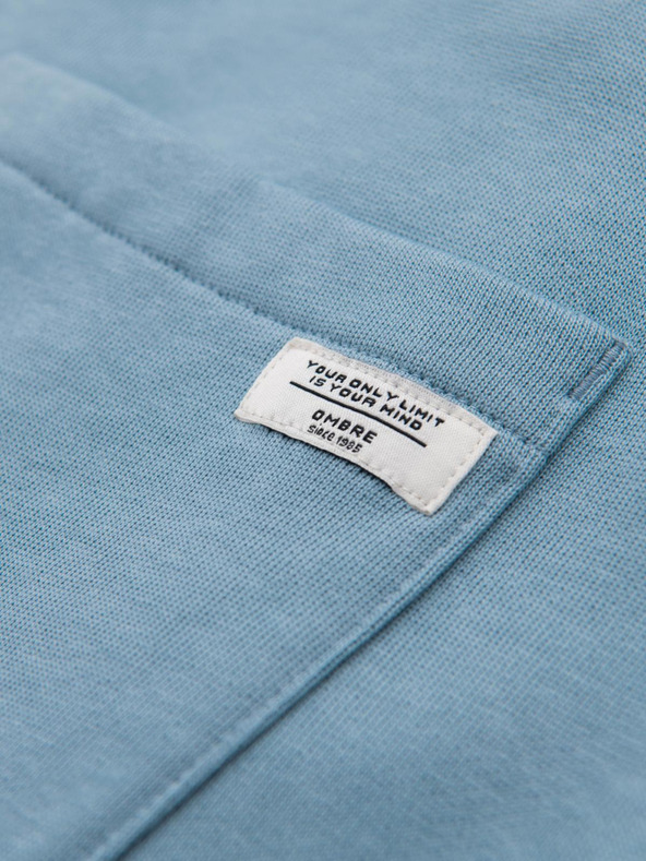 Ombre Clothing Svetlomodré pánske tepláky Ombre oblečenie