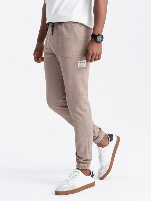Ombre Clothing Svetlohnedé pánske tepláky Ombre Oblečenie