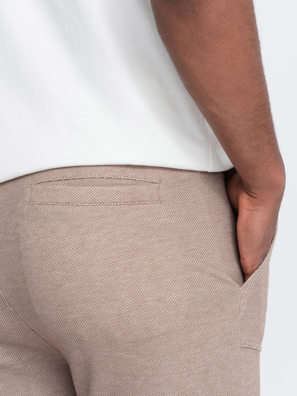 Ombre Clothing Svetlohnedé pánske tepláky Ombre Oblečenie